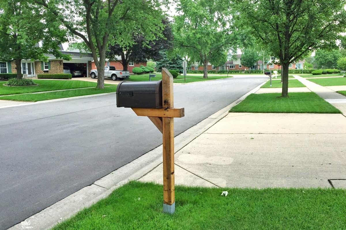 traditional american mailbox on side walk