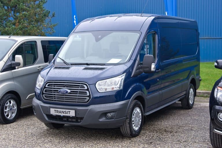 Ford Transit parked on the side of a warehouse, How Long Do Ford Transit Vans Last?