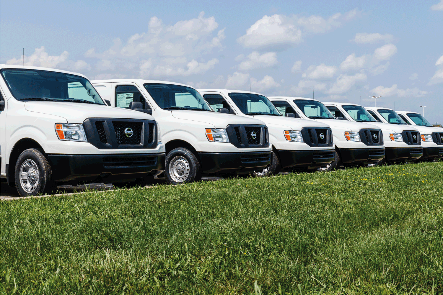 A fleet of Nissan NV Cargo Trucks. Nissan is part of the Renault–Nissan Alliance. How Much Does A Nissan NV Weigh [Inc. 2500 And 3500]