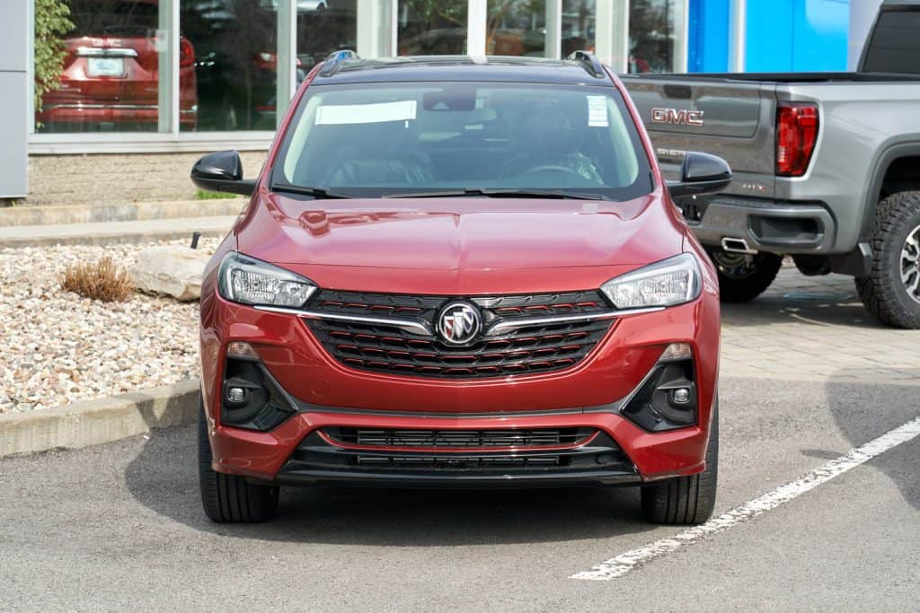 A red color Buick Encore parked outside a dealership, Does The Buick Encore Have A Sunroof?