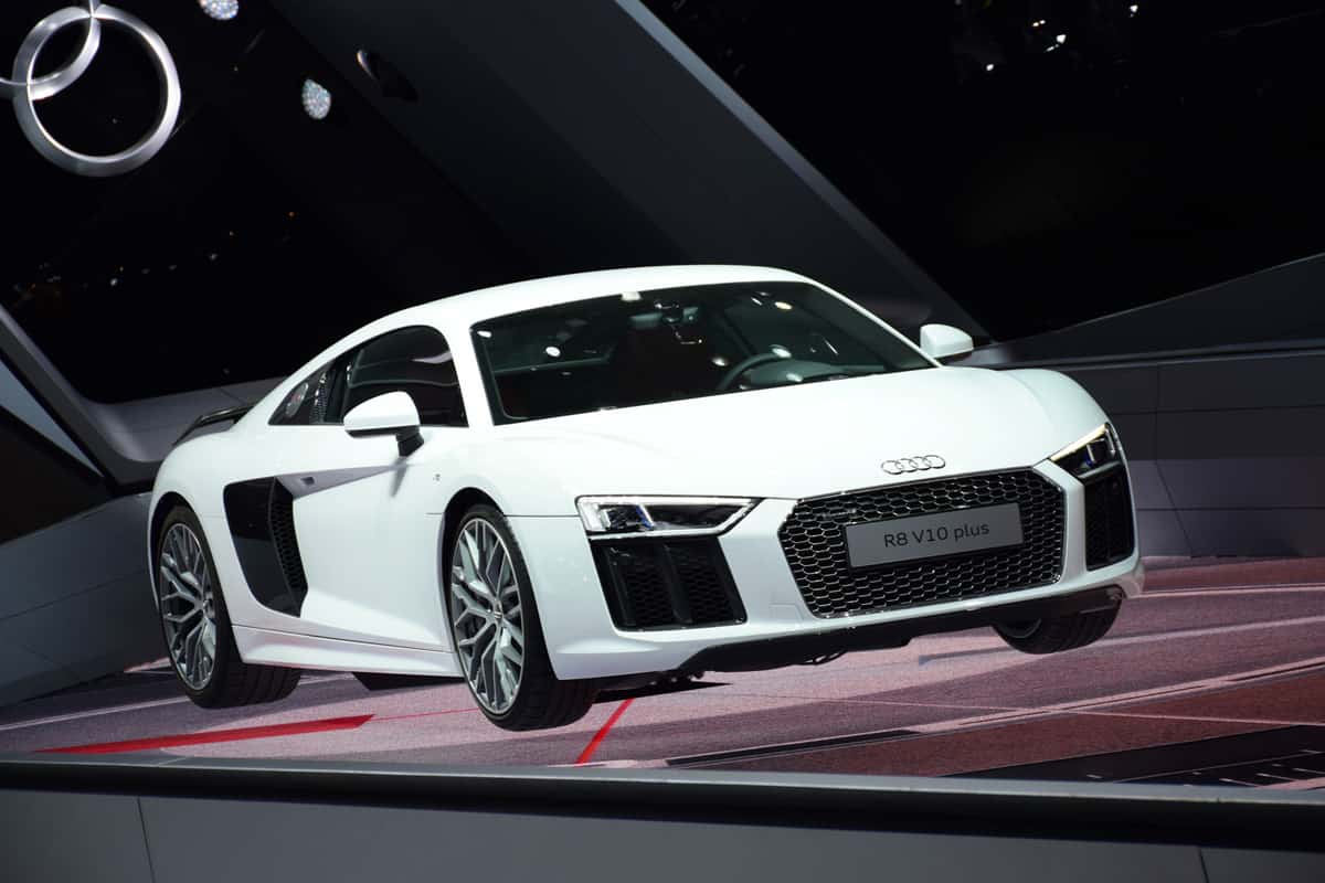 Audi R8 V10 Plus vehicle on the motor show. The supercar from Audi is powered by 5,2-litre petrol engine V10 (pushing out 585 HP