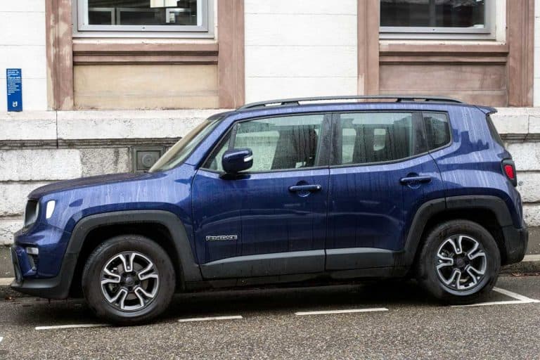 Blue Jeep renegade car parked in the street, How Many Miles Can A Jeep Renegade Last?