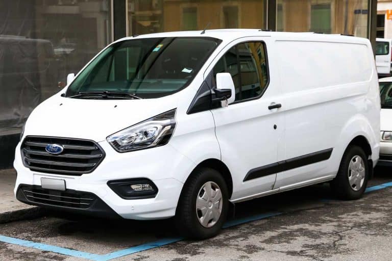 Cargo van Ford Transit in the city street, Can You Add Seats To A Ford Transit Cargo Van?