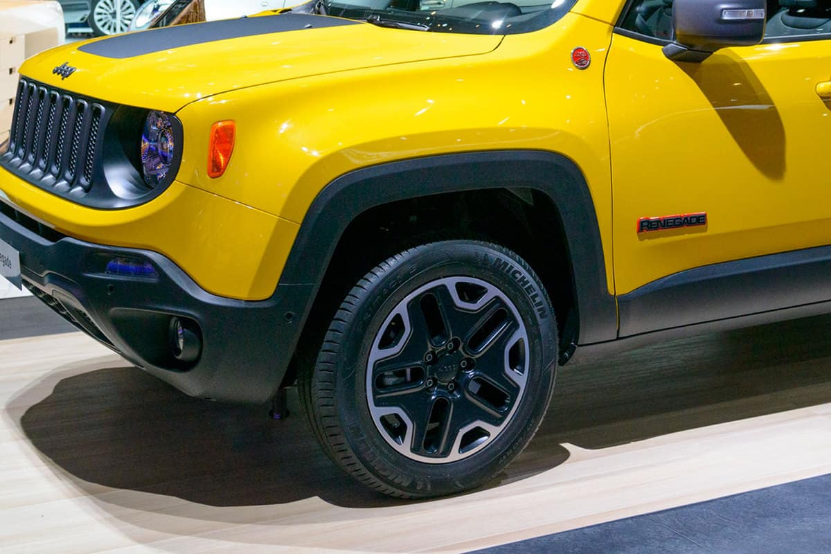 Close up photo of Jeep Renegade's tire crossover SUV on display during the 2015 Brussels motor show.,What Are The Best Tires For Jeep Renegade?