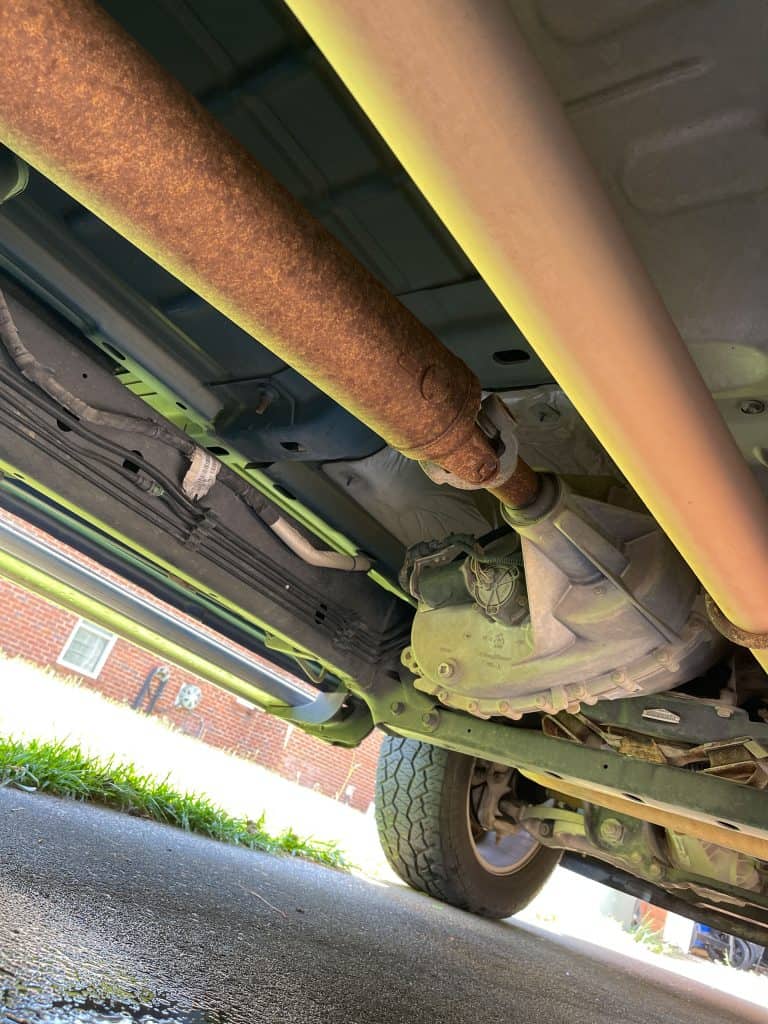 An underside of a car at the car shop, How To Protect The Underside Of A Car From Rust