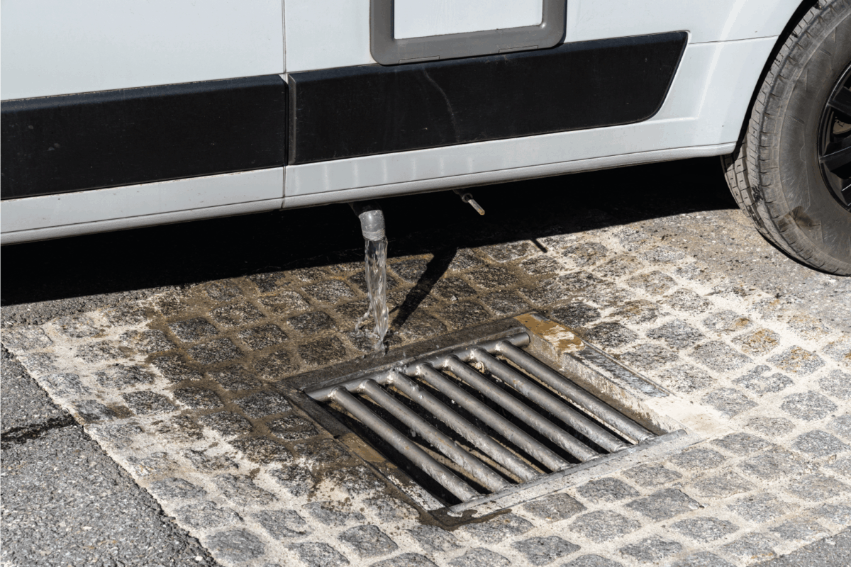 view of proper disposal of gray water and waste water from a camper van at an RV park
