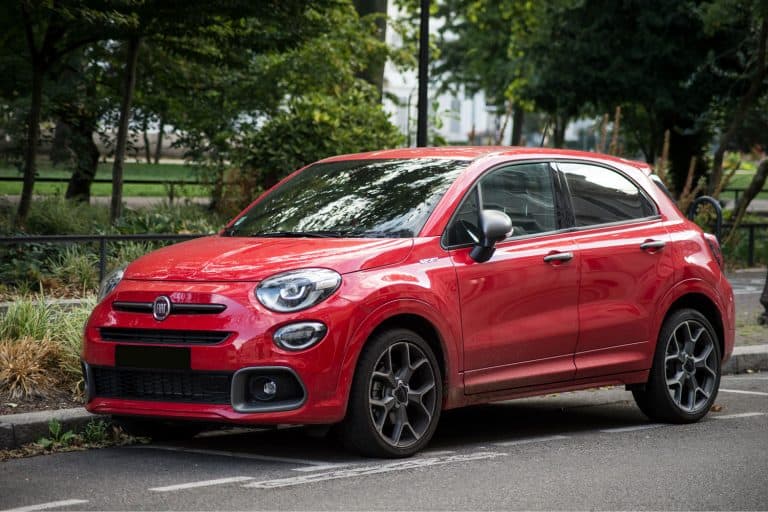 A red Fiat 500L on the side of the road, What Kind Of Gas Does A Fiat 500L Take?