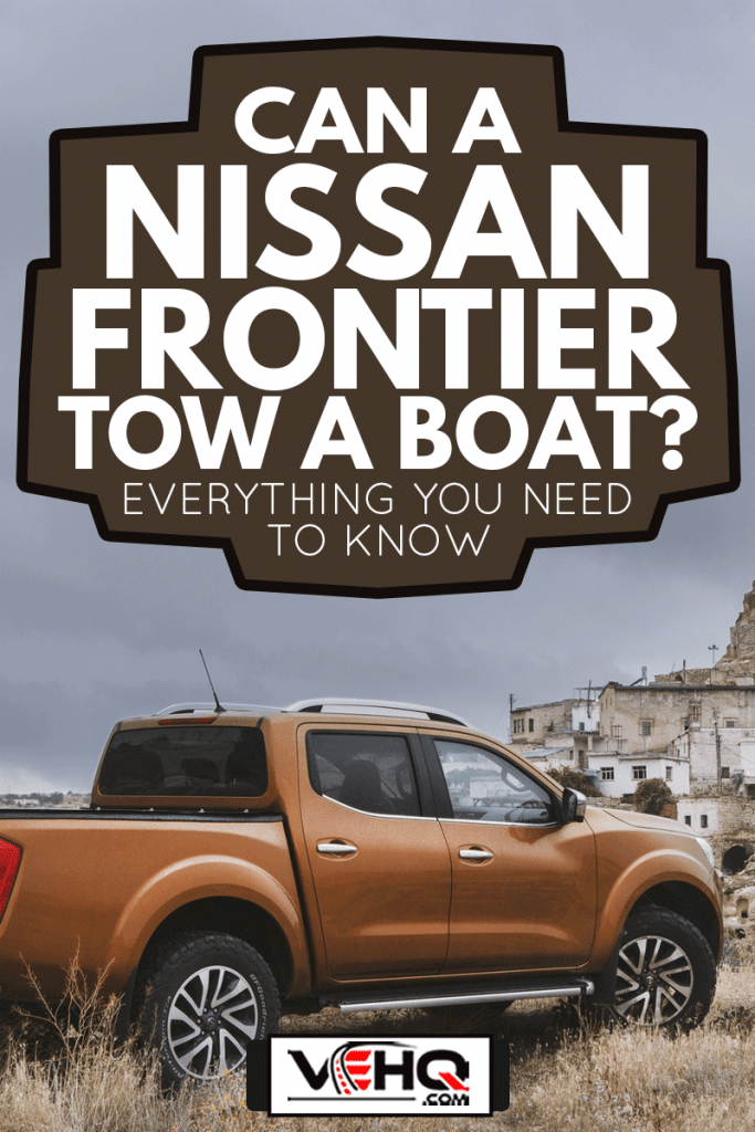 Nissan NP300 Navara stopped on the hill near Ortahisar Castle in Cappadocia, Can A Nissan Frontier Tow A Boat? [Everything You Need To Know]