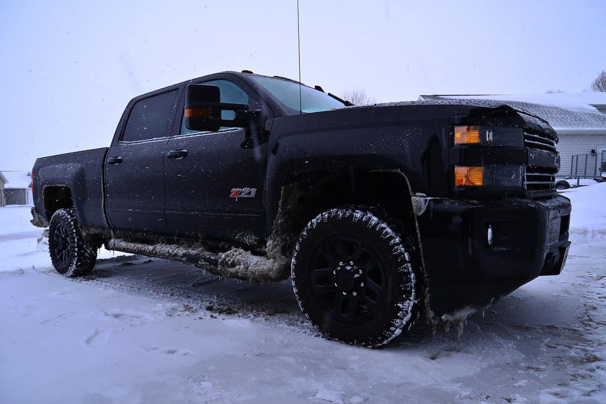 Chevrolet Silverado 2500HD LTZ Midnight Edition Duramax after a long winter drive on a very stormy day