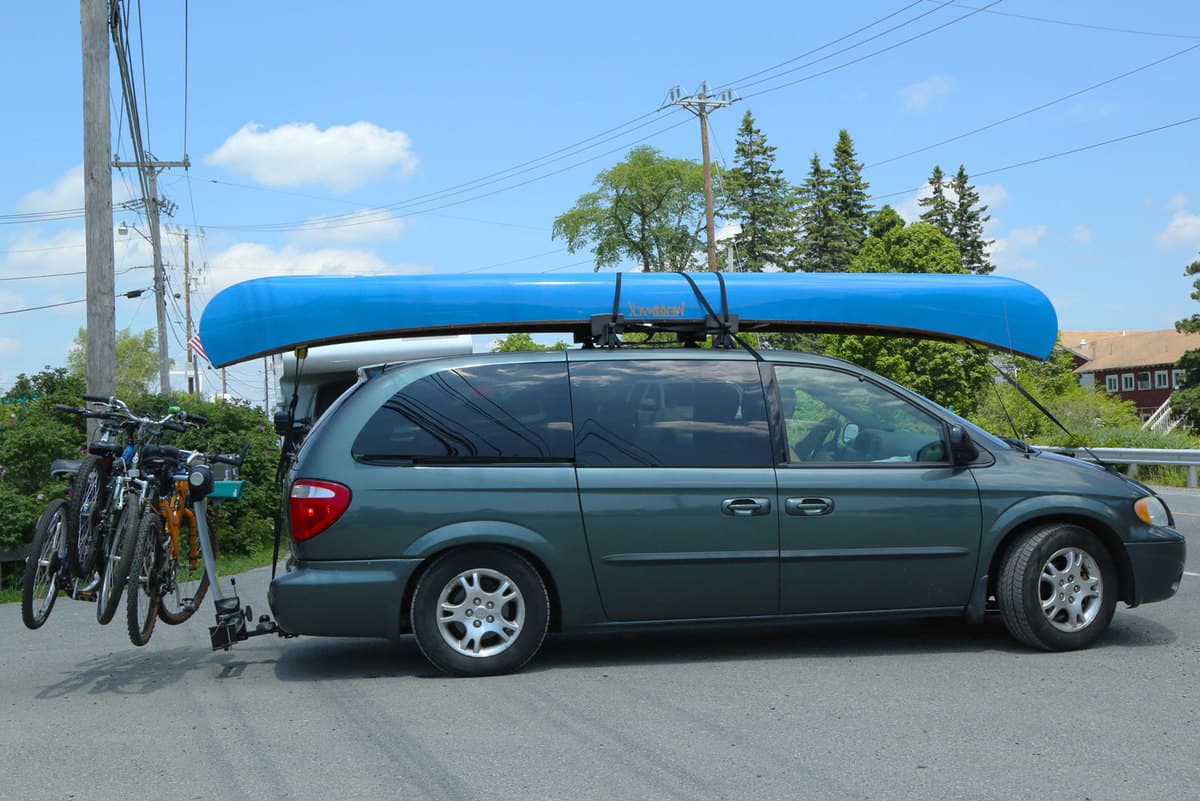 Dodge Caravan Van loaded with kayak and bicycles in Acadia National Park. , Can You Flat Tow A Dodge Grand Caravan?
