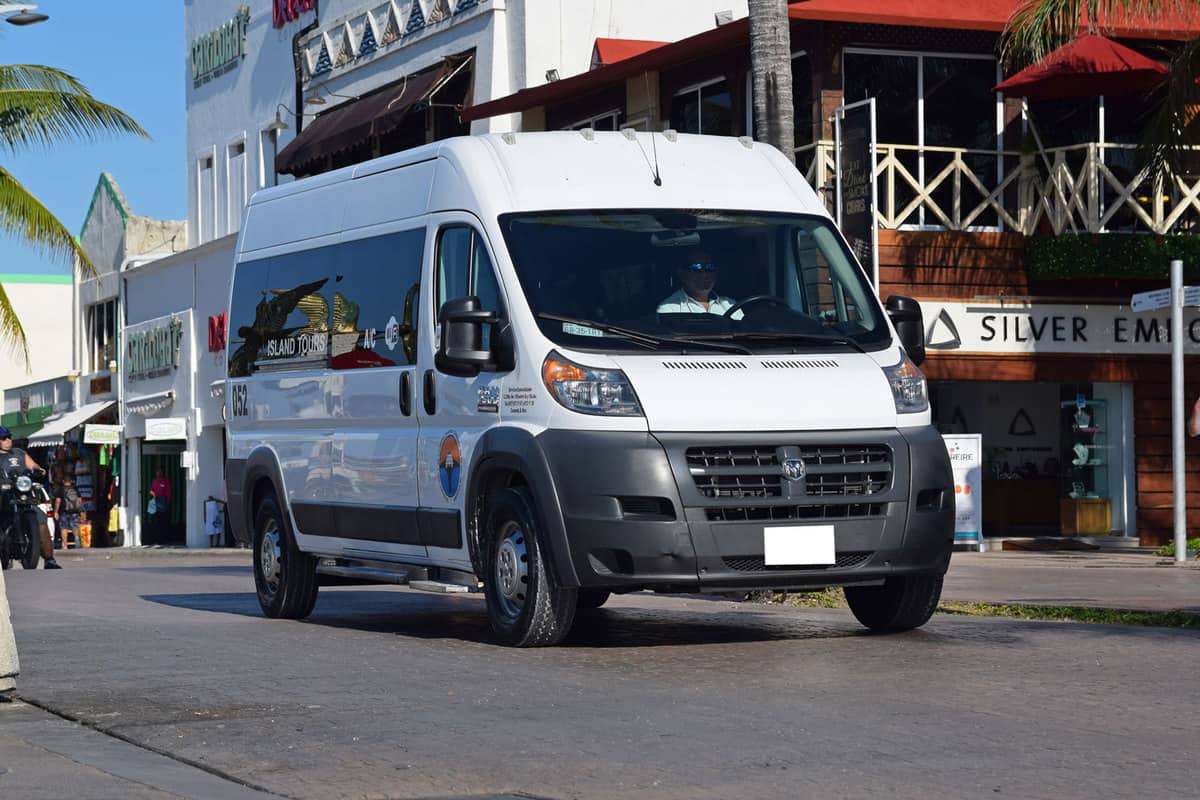 Ram 2500 Promaster in minibus version driving on the street