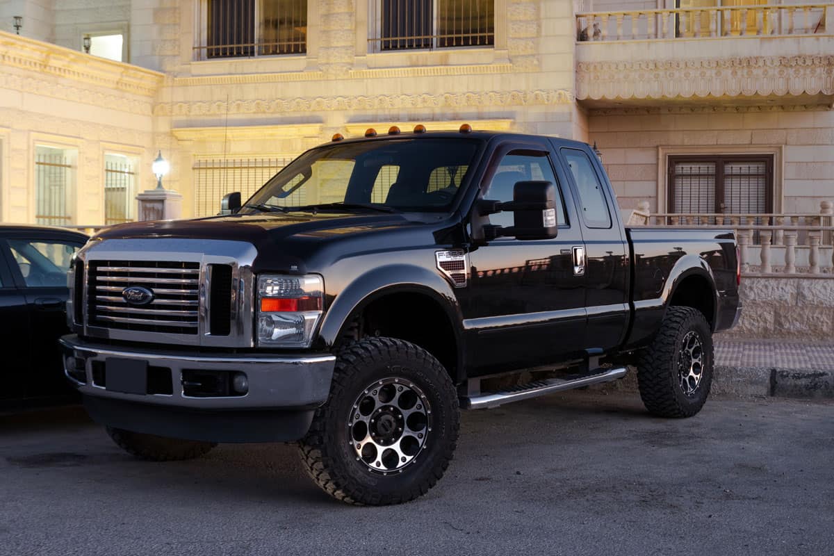 glossy black pick up truck ford f250