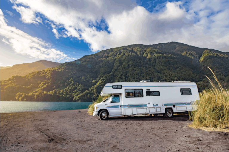 luxury RV motorhome with a picturesque mountain background view. RV Inverter Not Working - What To Do