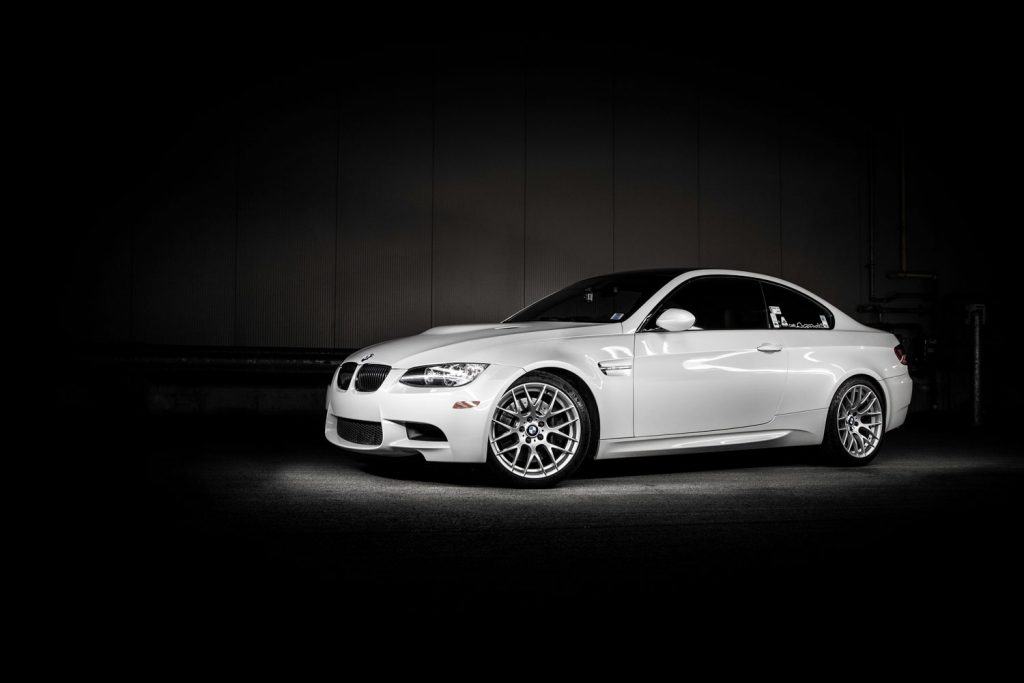 A BMW M3 parked in an industrial area. Light painted image