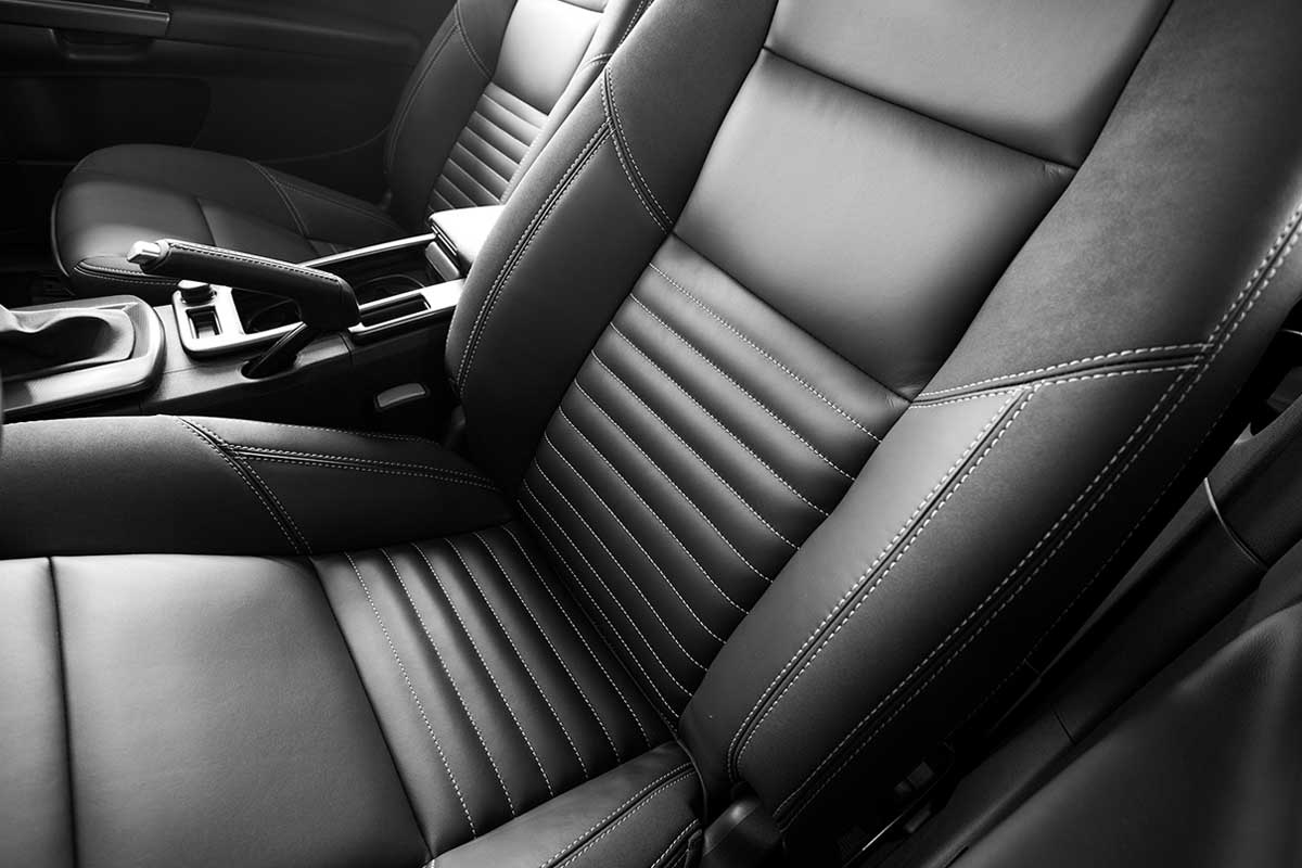 A black leather seat of a vehicle, Do Leather Car Seats Need Conditioning?