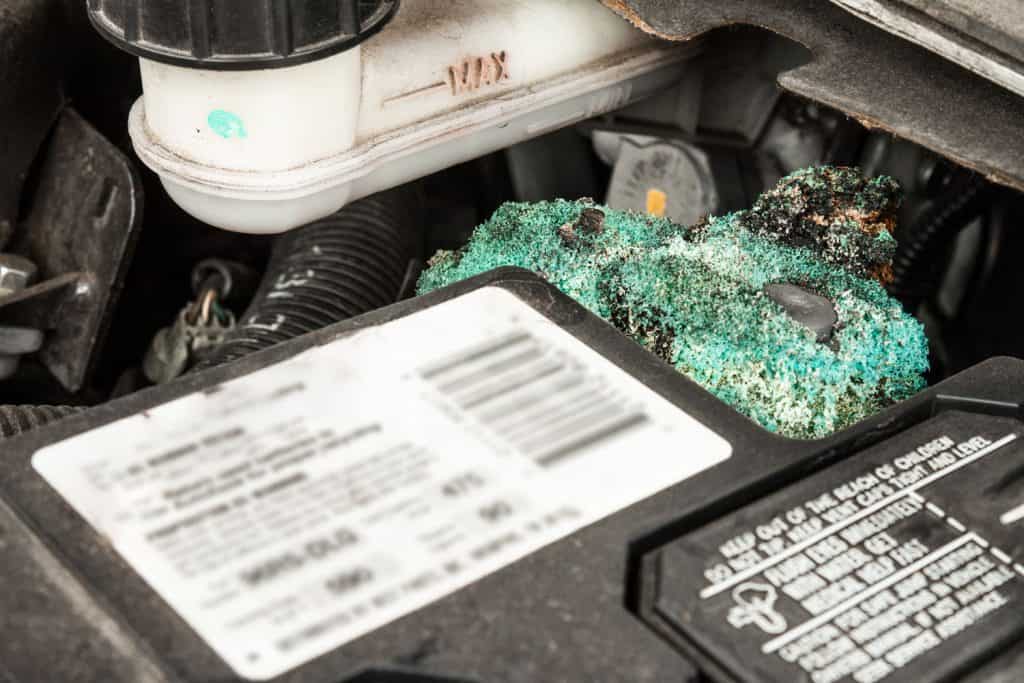 A corroded battery terminal in the engine