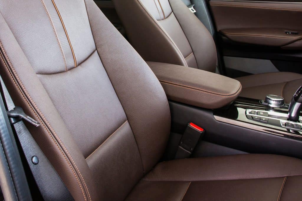 Brown leather seats in a luxurious high end car