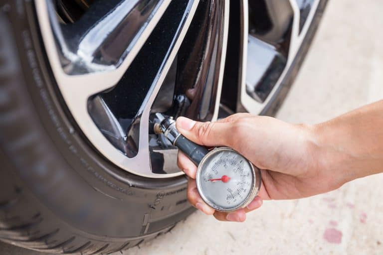 Checking the tire pressure using a pressure gauge, What Should The Tire Pressure Be On A Nissan Altima?