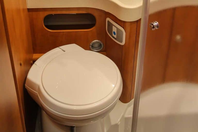 Exquisite compact interior of a camper bathroom, RV Toilet Foot Pedal Repair - What Owners Need To Know