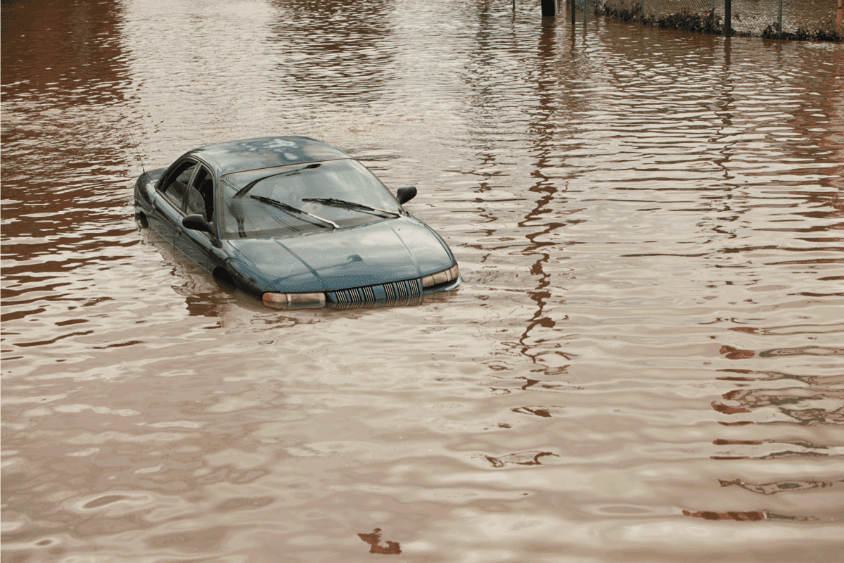 Flooded Car is Abandoned in the middle of flood waters
