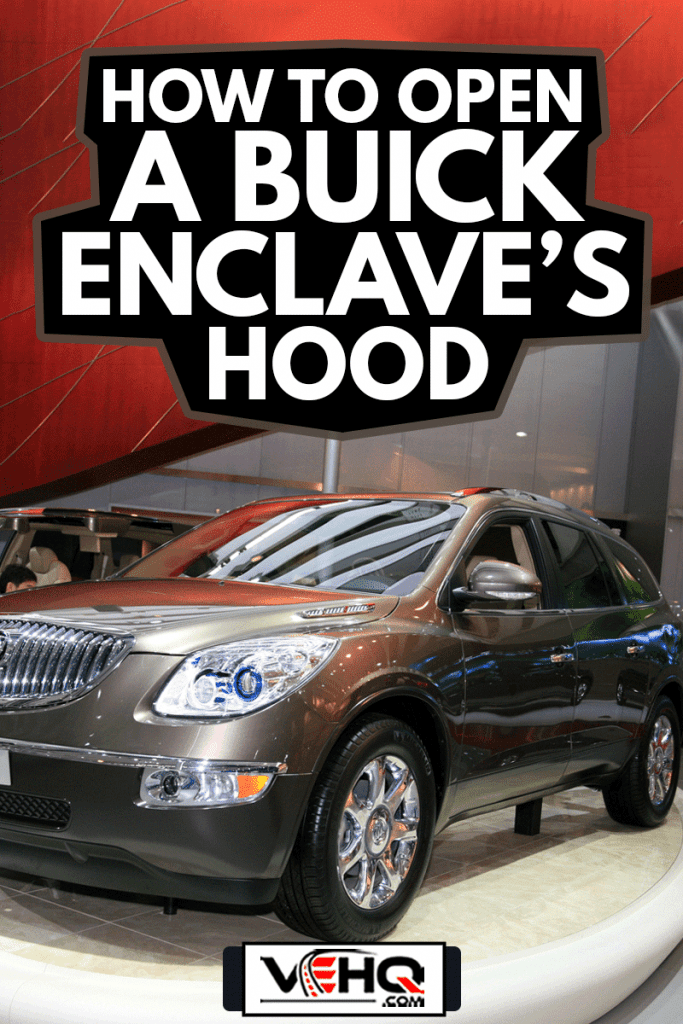 A Buick Enclave SUV is seen on display at the stand of GM (General Motors), How To Open A Buick Enclave's Hood