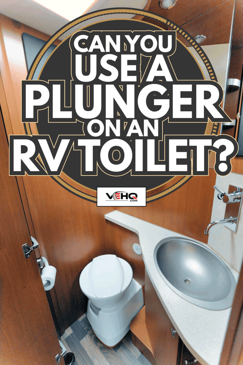 Inside of RV with washroom toilet sink shower cabinet. Can You Use A Plunger On An RV Toilet