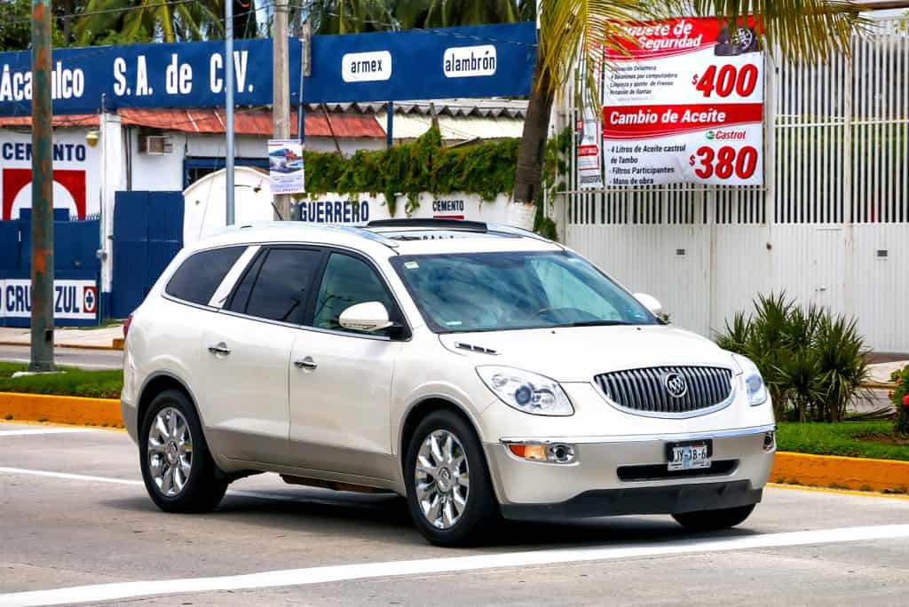 Motor car Buick Enclave in the city street.