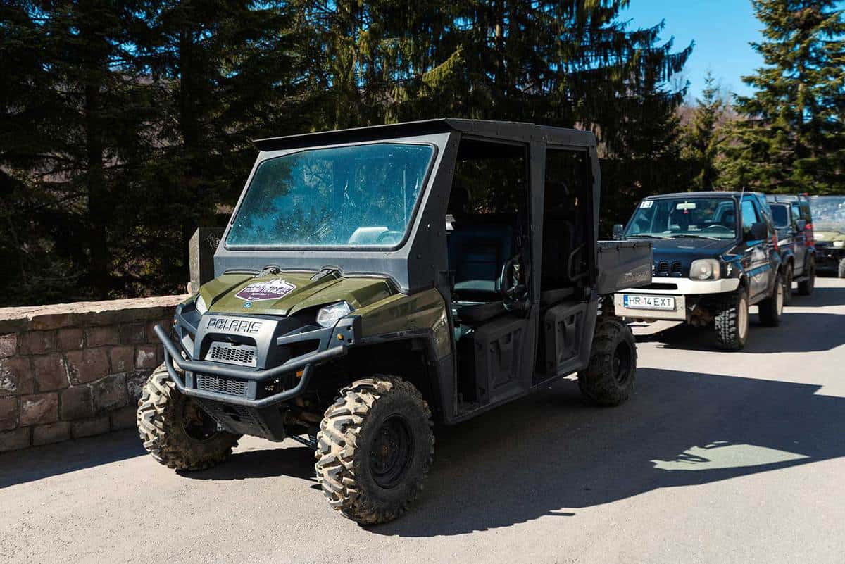 Polaris Ranger off-road vehicle parked on the road