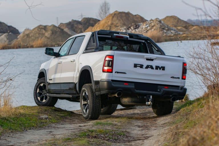 RAM 1500 Rebel stopped next to lake. RAM is one of the most popular pickup vehicles in North America, What Size Truck Do You Need For Towing A Toy Hauler?