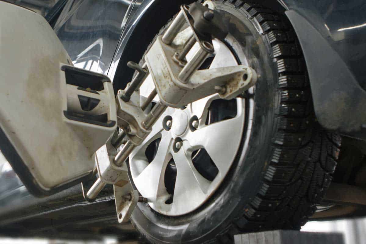 Technicians checking car wheels, Do Tires Need to Be Balanced When Rotated?