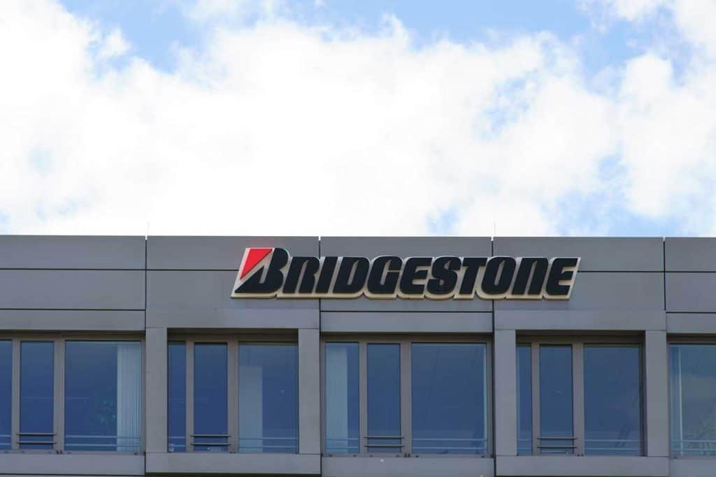 The logo of the tire manufacturer Bridgestone on the facade of a business building