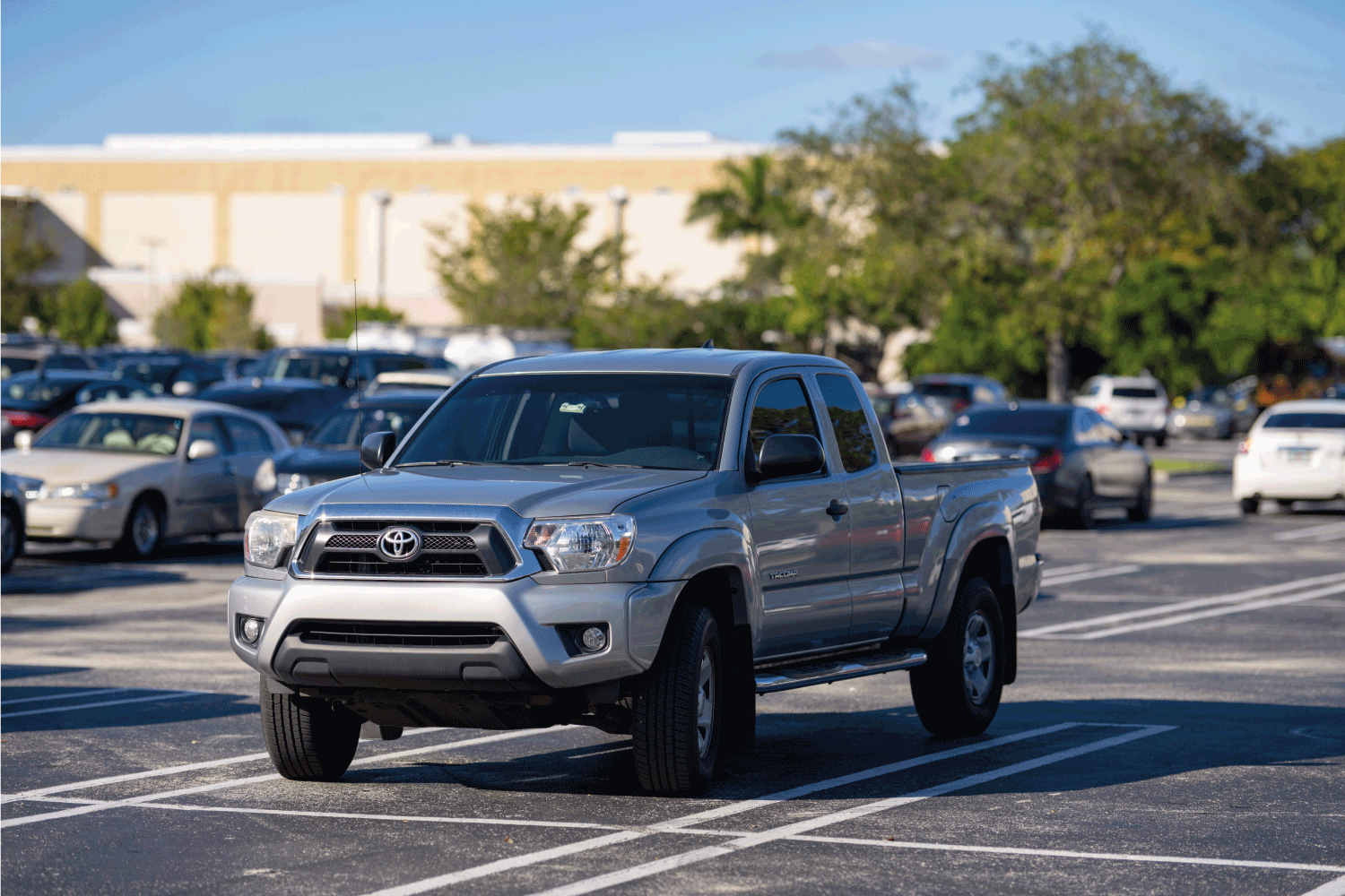 gray Toyota Tundra under the sun in a parking lot