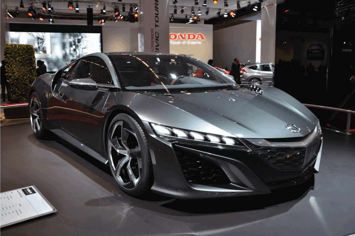 silver gray Acura NSX on display at a car show