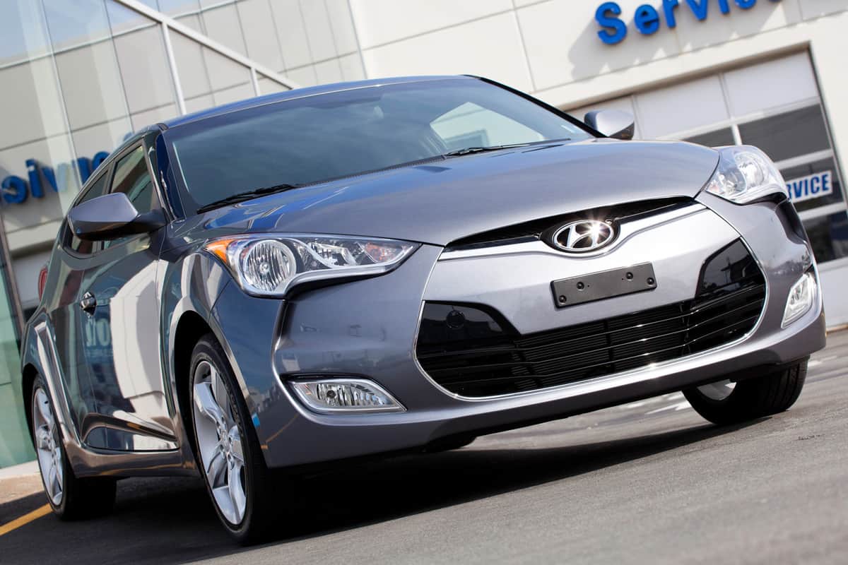 A Hyundai Veloster on a car dealership lot, Does The Hyundai Veloster Have A Sunroof?