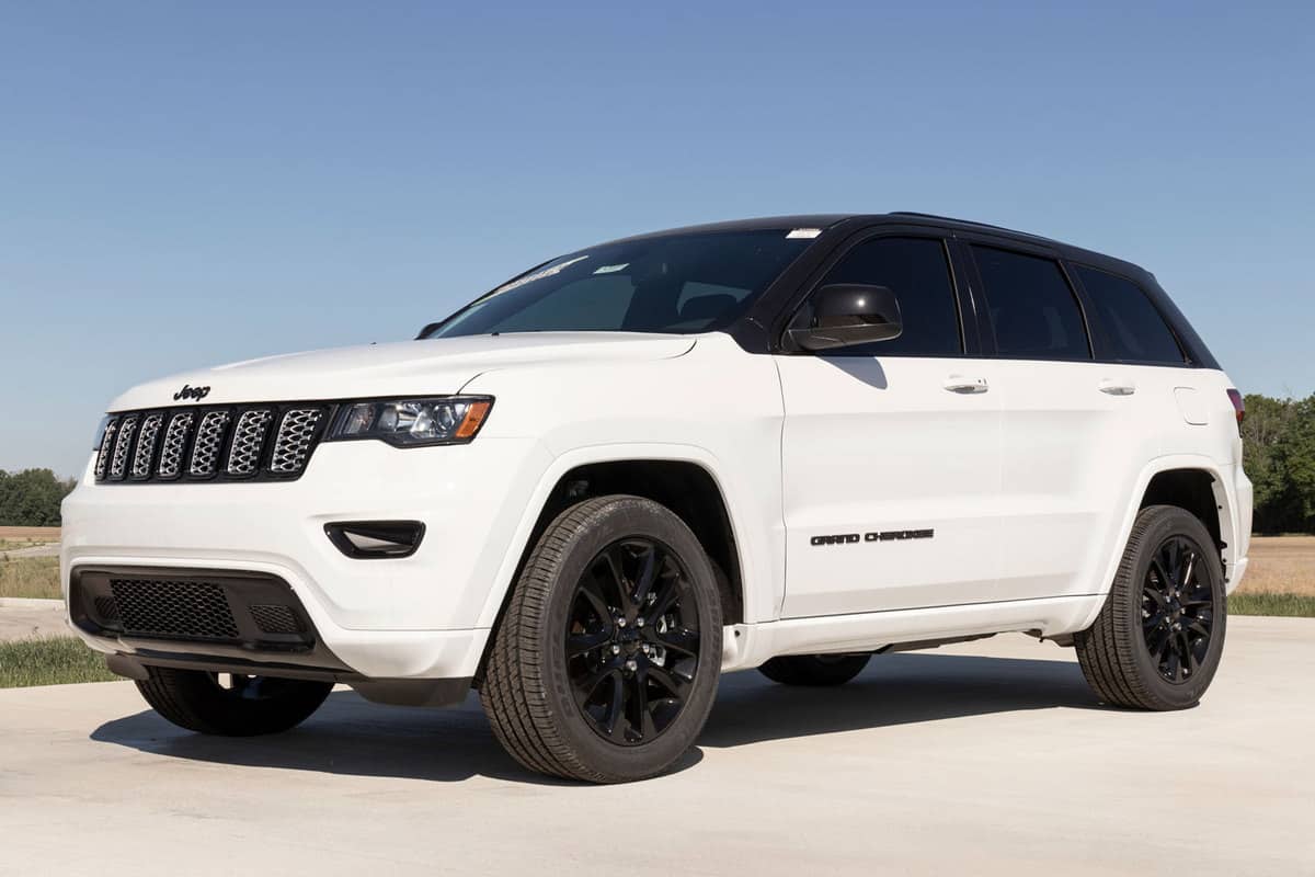A white 2021 Jeep Grand Cherokee, What Jeep Has At Least 6 Seats?