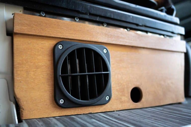 Air outlet vent of a heater in a camper van, How To Clean An RV Furnace [Including Ducts And Exhaust]