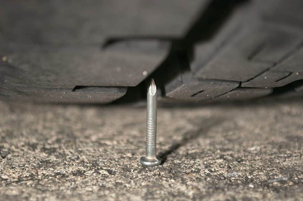 An arch-enemy tire and nail