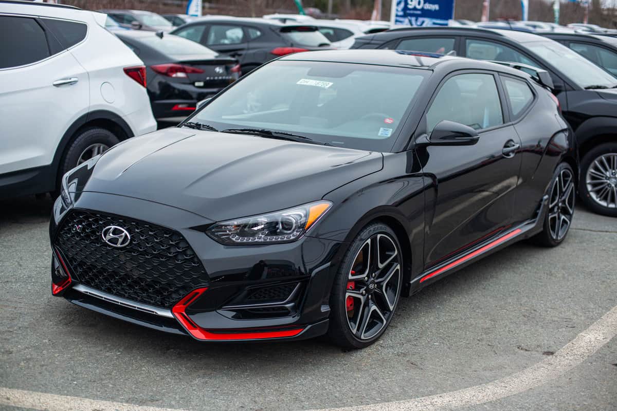 An awesome black colored Hyundai Veloster N photographed at the parking lot