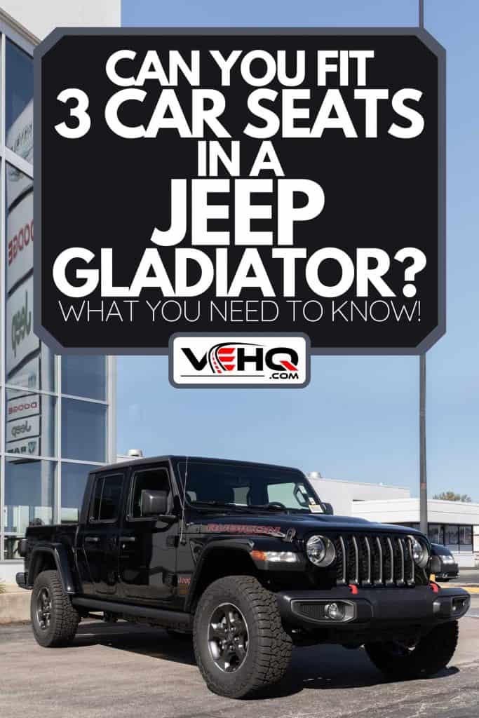 A Jeep Gladiator display at a Jeep Ram dealer, Can You Fit 3 Car Seats In A Jeep Gladiator? [What You Need To Know!]