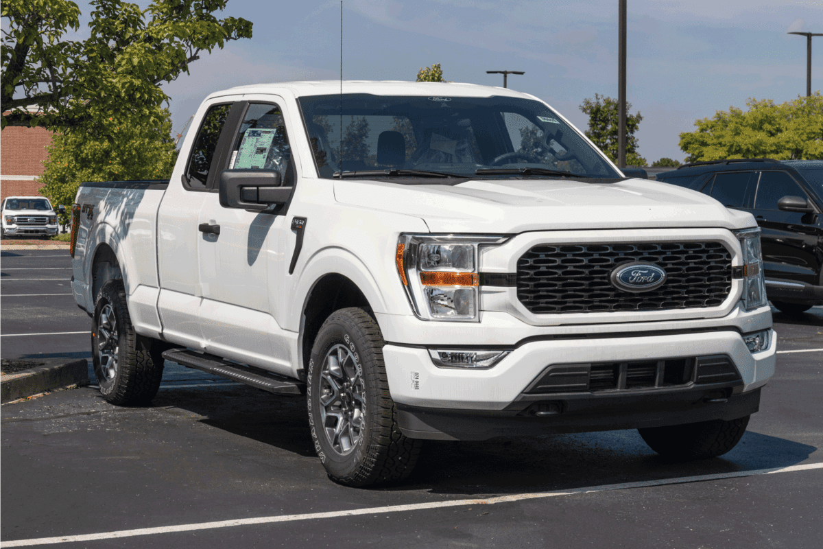 Circa August 2021: Ford F-150 display at a dealership. The Ford F150 is available in XL, XLT, Lariat, King Ranch, Platinum, and Limited models.