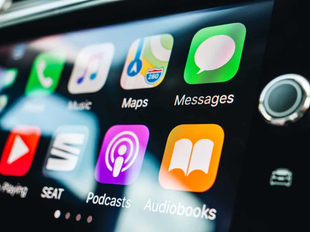  Details of App and icons on the the Apple CarPlay main screen in modern car dashboard during driving
