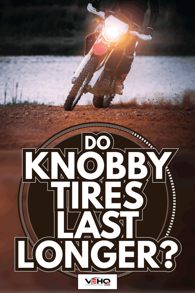 Enduro motorcycle biker slide moving on dirt field. Do Knobby Tires Last Longer