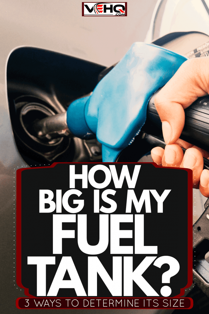 A man holding a fuel pump while refilling at the gas station, How Big Is My Fuel Tank? [3 Ways To Determine Its Size]