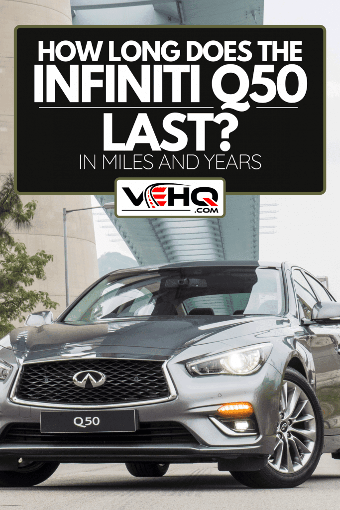 An Infiniti Q50 on the main road for test drive, How Long Does The Infiniti Q50 Last? [In Miles And Years]