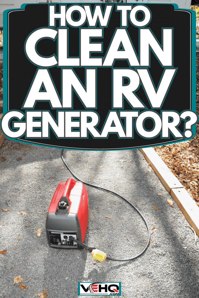 A red colored RV generator on the concrete, How To Clean An RV Generator?