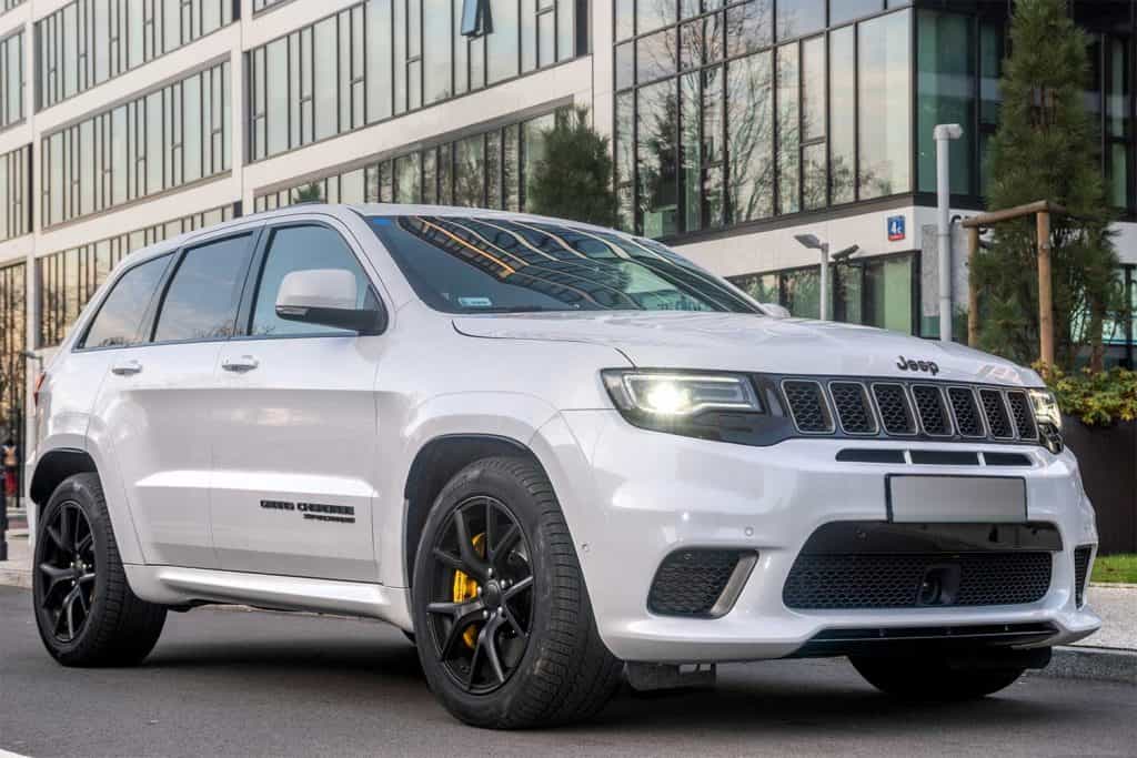 Jeep Grand Cherokee Trackhawk parked outside a building