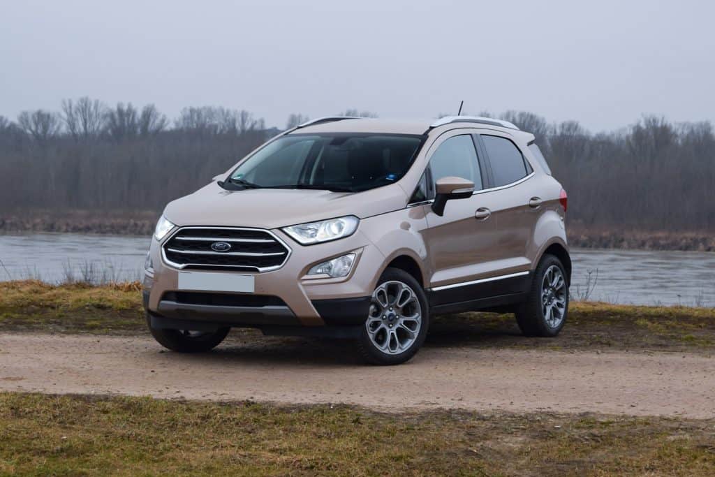 Modern crossover Ford EcoSport stopped on a road. This model is the smallest sport utility vehicle from Ford on the European market.