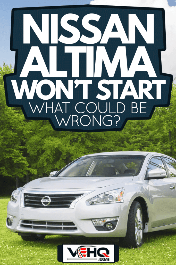 A silver redesigned 2013 model year Nissan Altima four door car, parked in the grass of an empty field, Nissan Altima Won't Start—What Could Be Wrong?