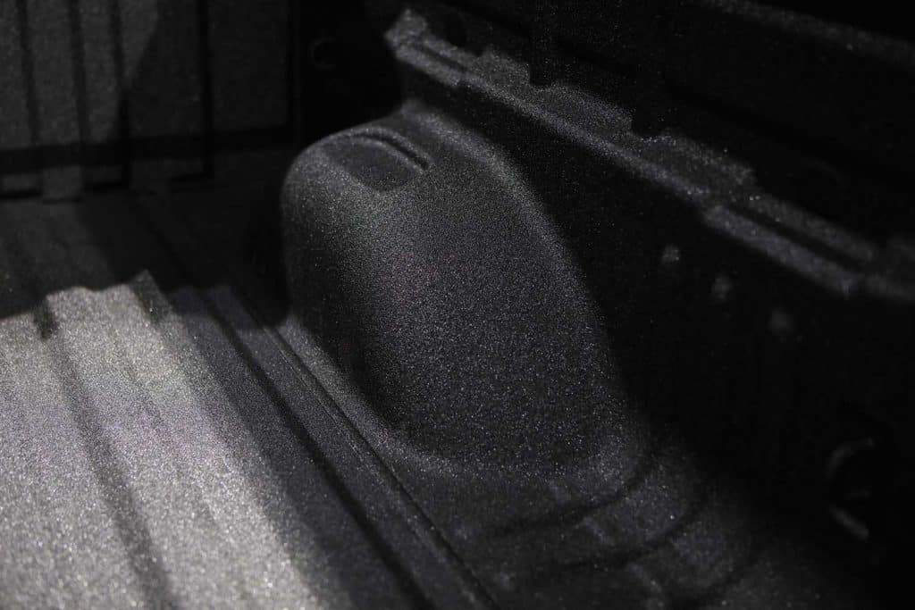 Protective surface on a pickup truck