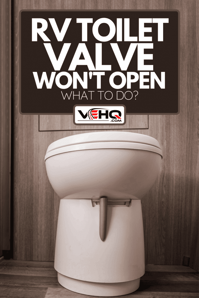 A white toilet in recreational vehicle restroom cabin, RV Toilet Valve Won't Open - What to Do?